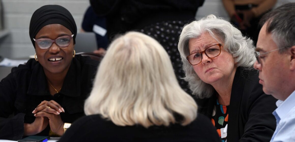 people engaged in discussion at a Citizens' Think-In