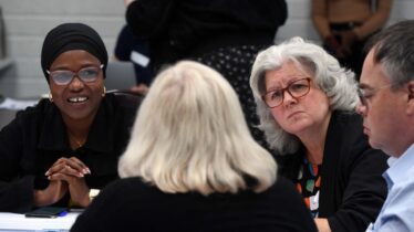 people engaged in discussion at a Citizens' Think-In